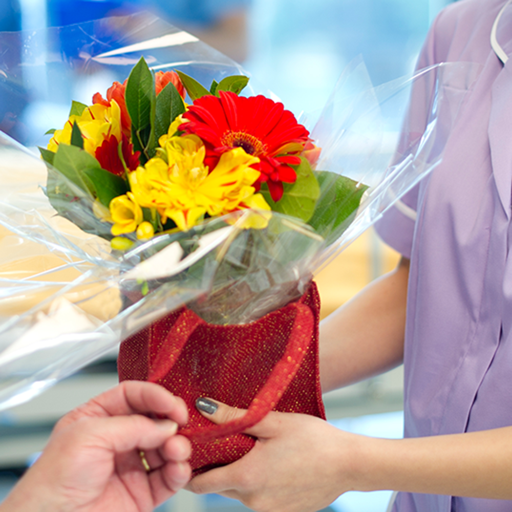 Volunteer with flowers